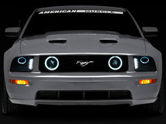 Raxiom 05-09 Ford Mustang w/ Halogen LED Halo Prjctr Headlights-Blk Hsng(Smoked Lens Exclude GT500)